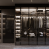 Luxury illuminated glass wardrobe with LED lights, by Woodnix Interior and Furniture – perfect for homes in Dubai, Abu Dhabi, Sharjah, and the UAE.