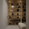 Luxury walk-in wardrobe with glass doors in Dubai, UAE