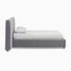 Side profile of low profile custom upholstered bed